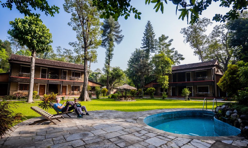 A swimming pool with guest that came with digital marketing strategy for hotel